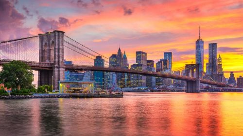New York, New York, USA Lower Manhattan skyline on the East River at dusk.